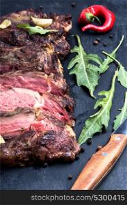 beef grilled steak. Grilled beef steak sliced on cutting board