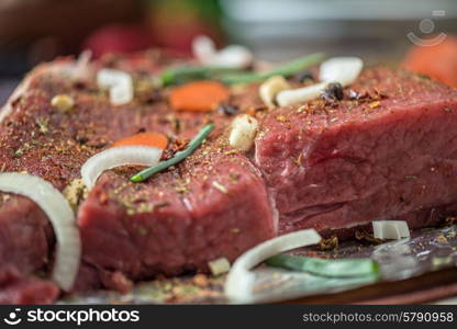 beef meat. Raw beef meat seasoned and ready to cooked