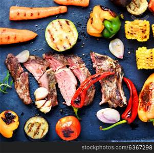 Beef meat with grilled vegetables. Set of grilled vegetables with bbq meat