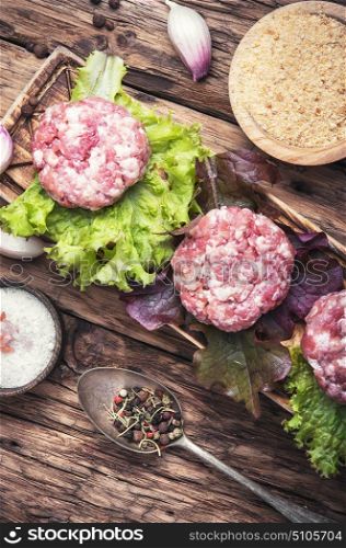beef minced meat. Raw minced meat beef with lettuce and spice