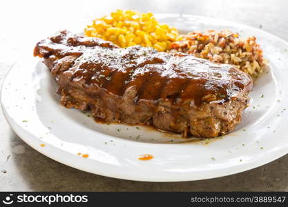 Beef New York Steak with sweet corn and brown rice