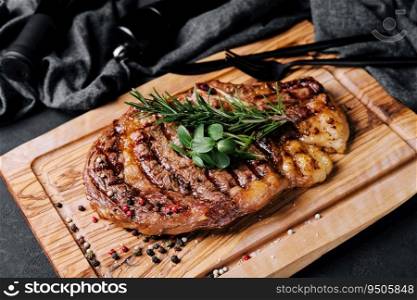 Beef rump steak on black stone table