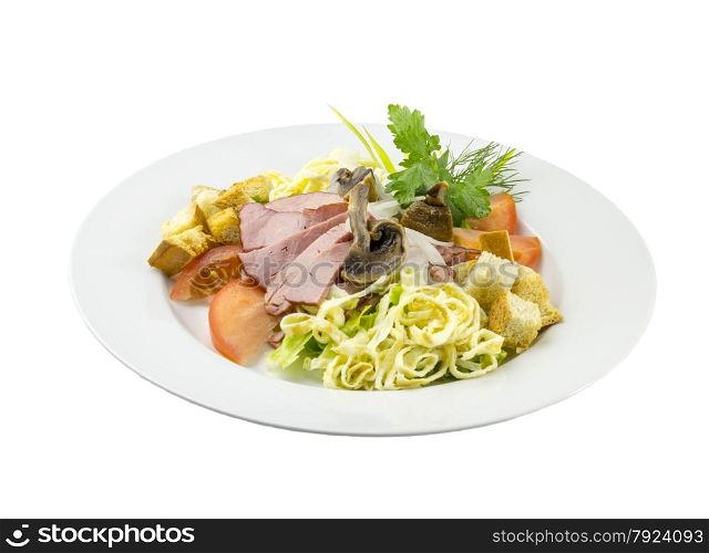 Beef salad with mushrooms and tomatoes on a dish with isolated backround. Beef salad with mushrooms and tomatoes
