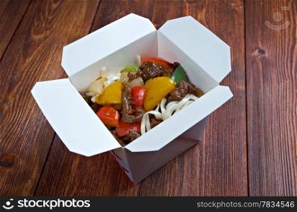 Beef slice and udon-noodle.chinese cuisine in take-out box