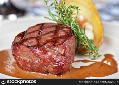 beef steak. grilled beef steak with herbs and vegetables