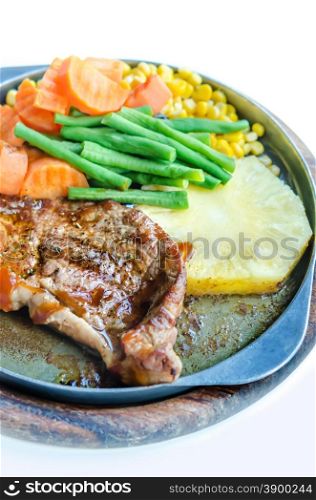 beef steak. Grilled Steak on Cast Iron Pan with vegetables on the Side
