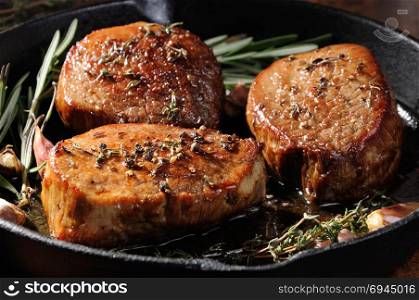 Beef steak. Juicy medium Rib Eye steak slices herbs spices