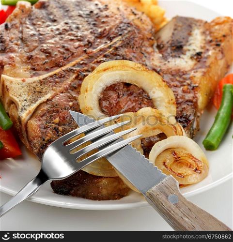 Beef Steak With Vegetables And Fries