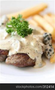 Beef steak with white sauce