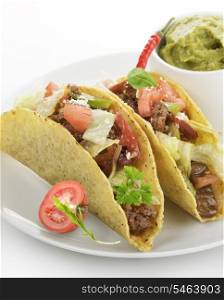 Beef Tacos In A White Plate