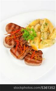 beef tongue with potatoes, carrots and greenery