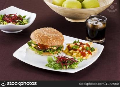 Beefburger with crispy salad leaves and chips