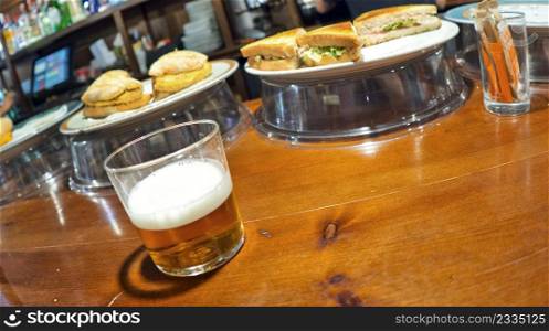 Beer and Typical Spanish Tapas at Bar Restaurant, Spain