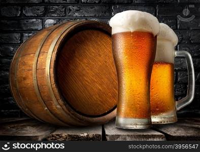 Beer and wooden keg near black brick wall
