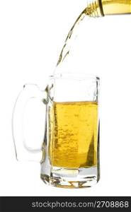 Beer being poured into a beer mug. Shot on white background.