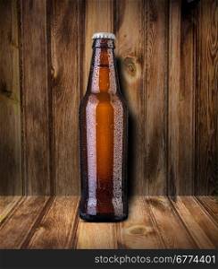 Beer bottle on wooden background - Vintage effect style pictures