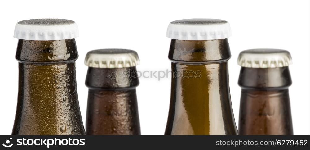 Beer bottles isolated studio shot. Close up Brown bottles
