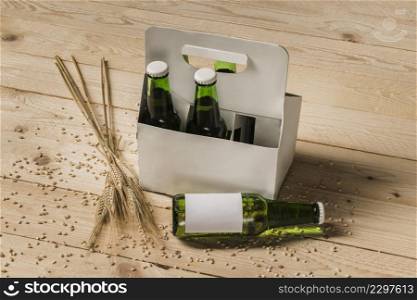 beer carton box ears wheat wooden background