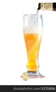 Beer flowing in the glass isolated on white