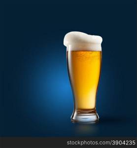 Beer in glass on blue background