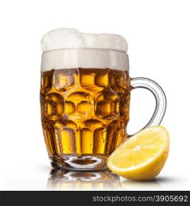 Beer in glass with lemon isolated on white background
