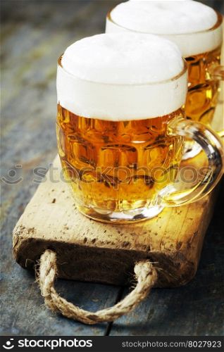 beer on wood background with copyspace