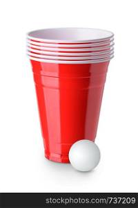 Beer pong. Red plastic cups and ping pong ball isolated on white background