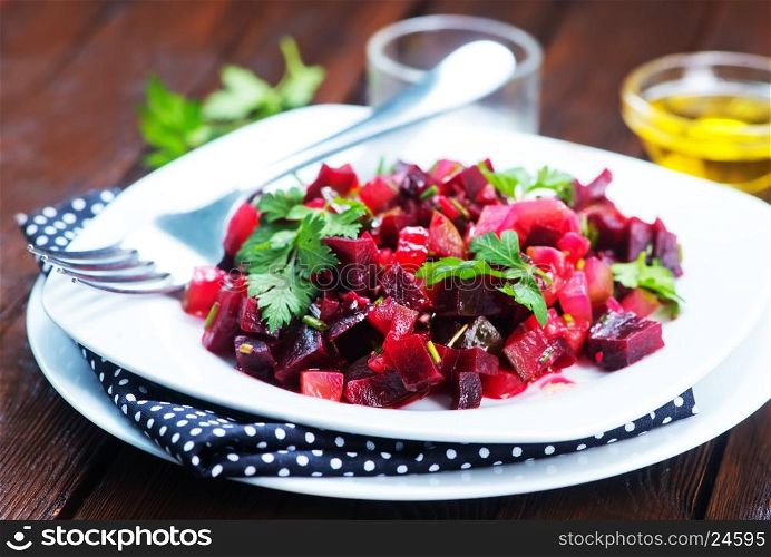 beet salad on plate and on a table