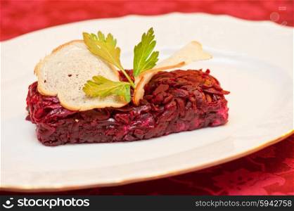 beet salad with rusk bread . beet salad with rusk bread at plate