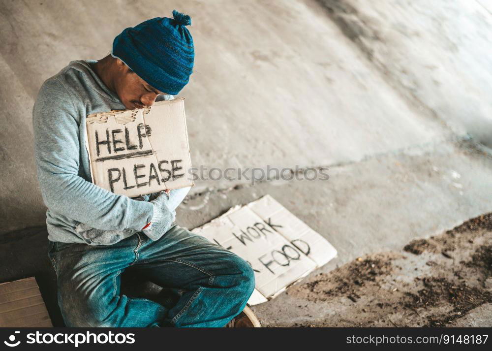 The Man Sitting Begging On An Overpass With Messages Homeless People ...