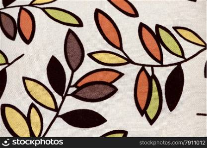 beige background with leaves of plants