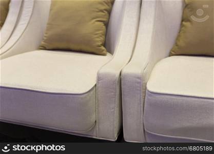 beige fabric chair in cozy living room