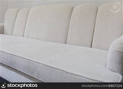 beige fabric sofa couch - living room