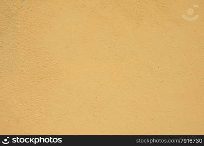 Beige painted plaster surface closeup as background