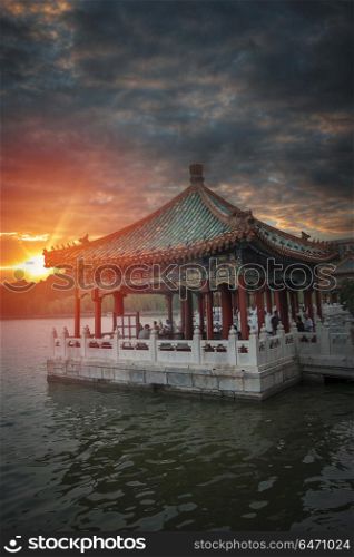 Beihai Park is the imperial garden to the north-west of the Forbidden City in Beijing. China. Beihai Park