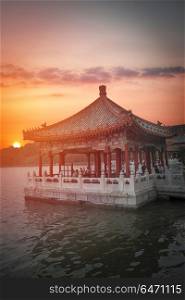 Beihai Park is the imperial garden to the north-west of the Forbidden City in Beijing. China. Beihai Park