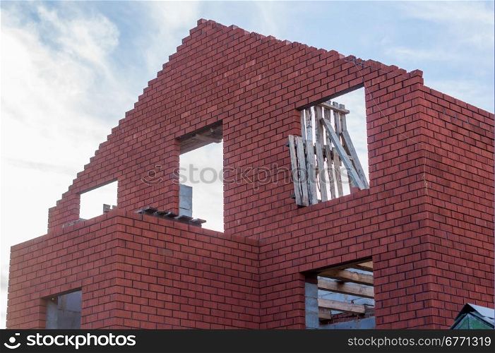being built red brick house