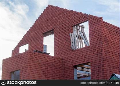 being built red brick house
