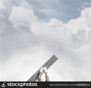 Being on verge. Woman standing on the edge of wooden board