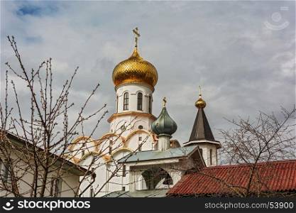 Belarus, Minsk - 08.04.2017: belfry and gilded dome of the Church of St. Michael the Archangel