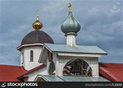 Belarus, Minsk - 08.04.2017: Belfry with bells of the Church of St. Michael the Archangel