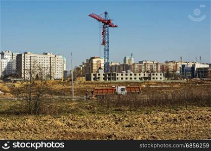 Belarus, Minsk - 20.04.2017: Tower crane on the construction of a multistory apartment building