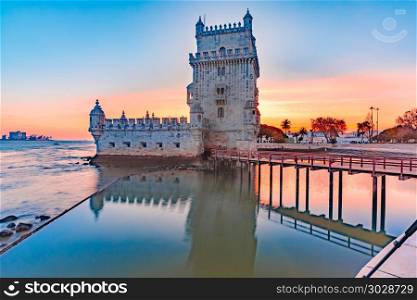 Belem Tower in Lisbon at sunset, Portugal. Belem Tower or Tower of St Vincent on the bank of the Tagus River at scenic sunset, Lisbon, Portugal