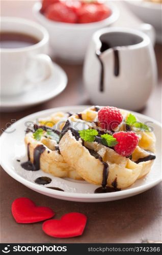 Belgian waffle with chocolate raspberry and hearts for Valentines Day