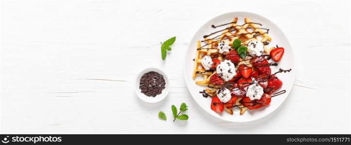 Belgian waffles with fresh strawberry, chocolate topping and whipped cream. Banner