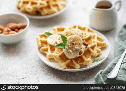 Belgian waffles with fruit, bananas and honey. Homemade baking. Concept of healthy breakfasts.