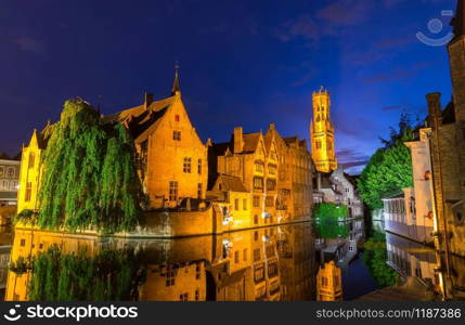 Belgium, Brugge, ancient European town with river channels, night cityscape, panoramic view. Tourism and travel, famous europe landmark, popular places. Belgium, Brugge, night cityscape, panoramic view