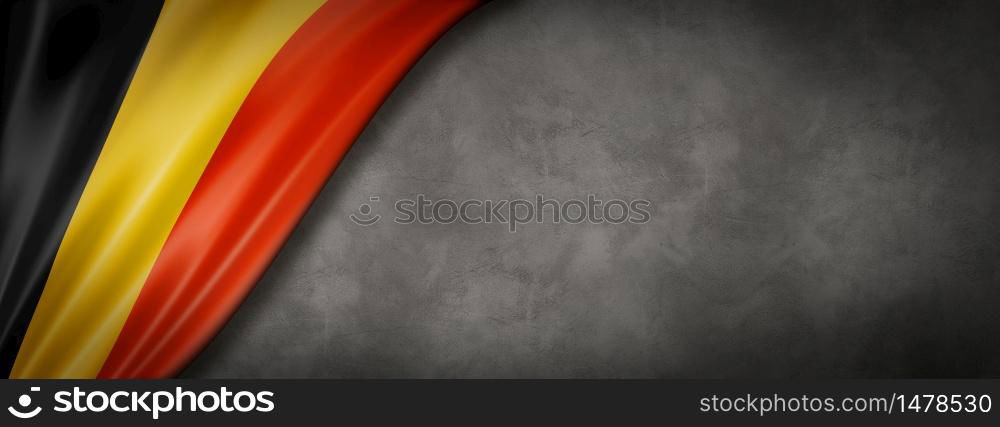 Belgium flag on concrete wall. Horizontal panoramic banner. 3D illustration. Belgian flag on concrete wall banner