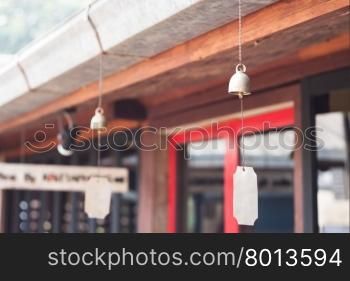 Bell hang on wooden roof, stock photo