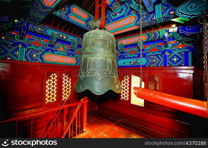 Bell hanging in a temple, Beihai Park, Beijing, China